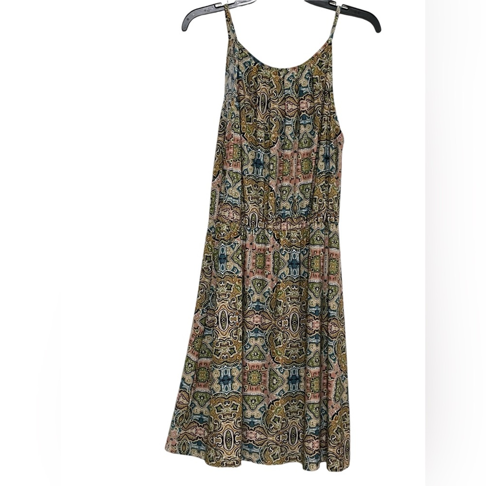 Tacera dress in a silky beautiful vibrant colored designed fabric. Size M; EUC .